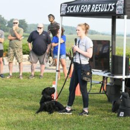 Staff member speaking to a crowd